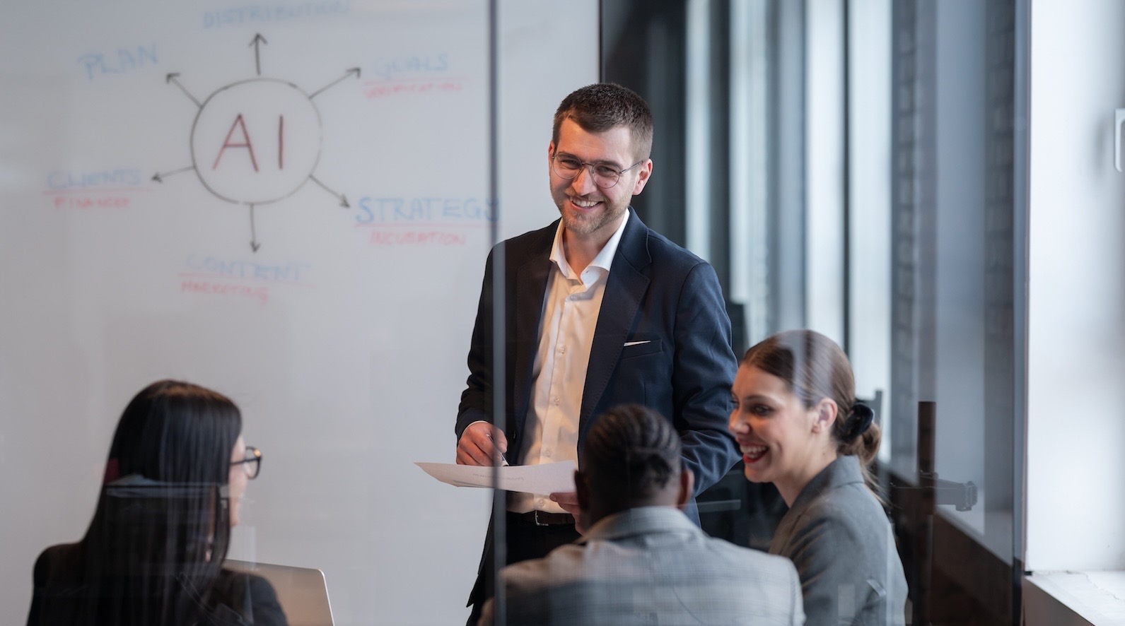 Team discussing an AI strategy around a conference table